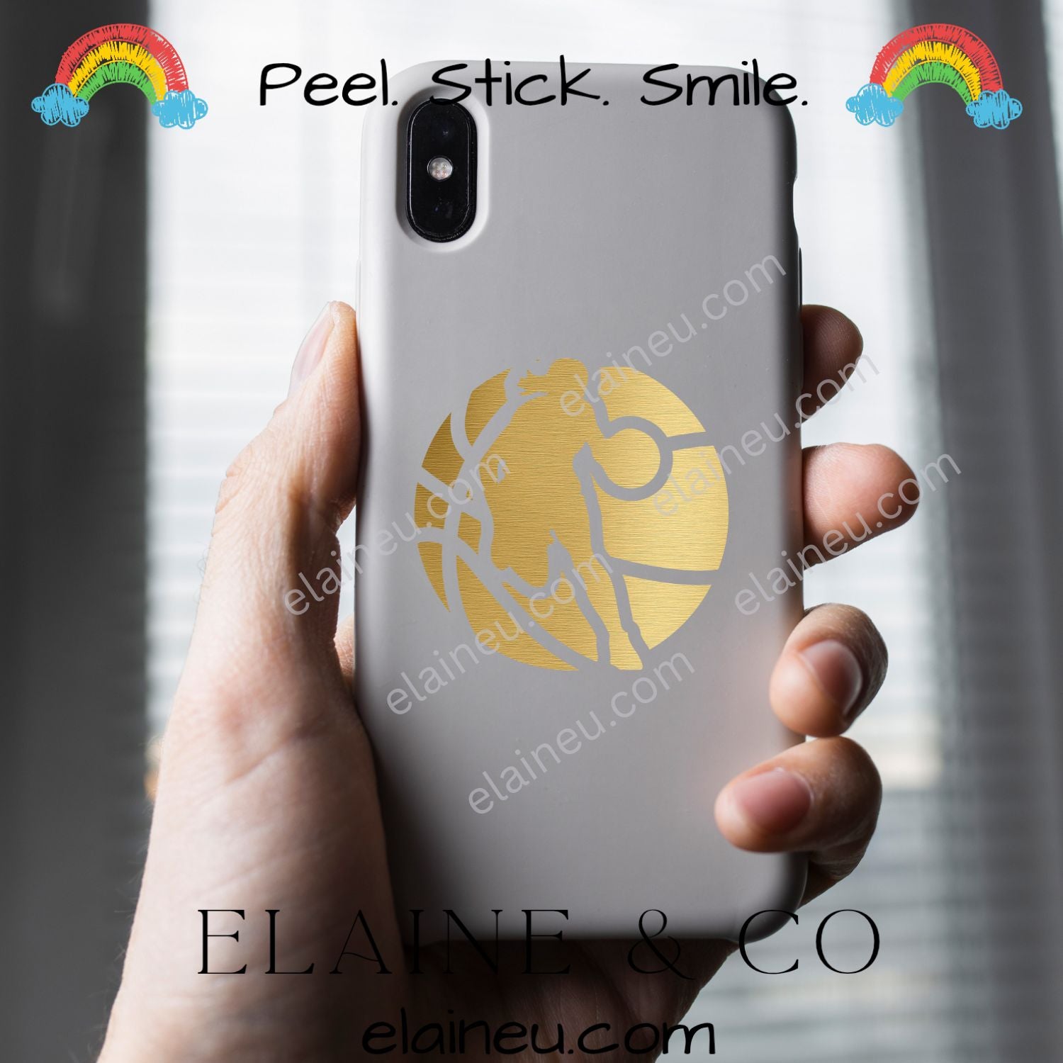 Phone case with gold lion design held by a hand, branded 'ELAINE & CO'.